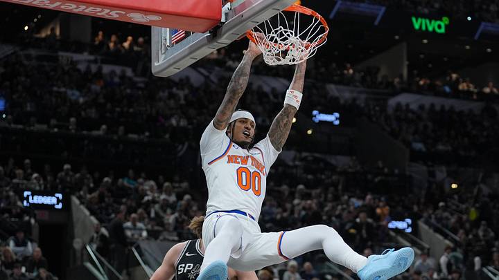 Dec 31, 2025; San Antonio, Texas, USA; New York Knicks guard Jordan Clarkson (00) dunks in front of San Antonio Spurs forward Kelly Olynyk (8) in the second half at Frost Bank Center. Mandatory Credit: Daniel Dunn-Imagn Images Dec 31, 2025; San Antonio, Texas, USA; New York Knicks guard Jordan Clarkson (00) dunks in front of San Antonio Spurs forward Kelly Olynyk (8) in the second half at Frost Bank Center. Mandatory Credit: Daniel Dunn-Imagn Images