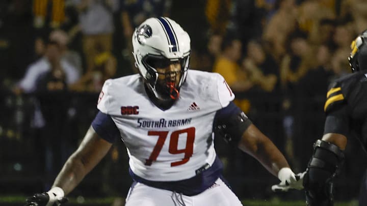 Sep 19, 2024; Boone, North Carolina, USA;  Appalachian State Mountaineers defensive end Michael Fletcher (5) runs toward South Alabama Jaguars offensive lineman Jordan Davis (79) during the second half at Kidd Brewer Stadium. Mandatory Credit: Reinhold Matay-Imagn Images