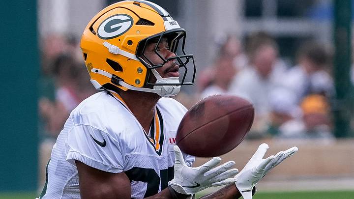 Green Bay Packers running back Pierre Strong Jr. (35) catches a punt during practice at training camp. Green Bay Packers running back Pierre Strong Jr. (35) catches a punt during practice at training camp.