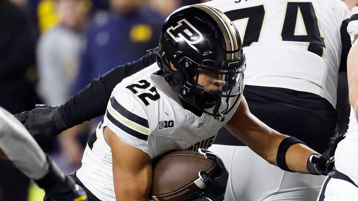 Purdue Boilermakers running back Antonio Harris (22) rushes the football. Purdue Boilermakers running back Antonio Harris (22) rushes the football.