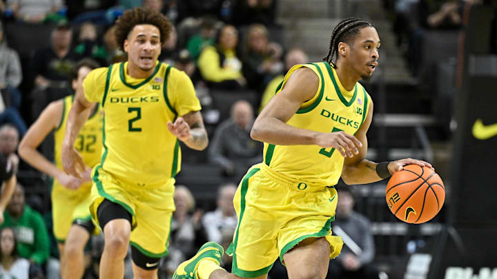 Dec 8, 2024; Eugene, Oregon, USA; Oregon Ducks guard TJ Bamba (5) dribbles the ball during the first half against the UCLA Bruins at Matthew Knight Arena. Mandatory Credit: Craig Strobeck-Imagn Images