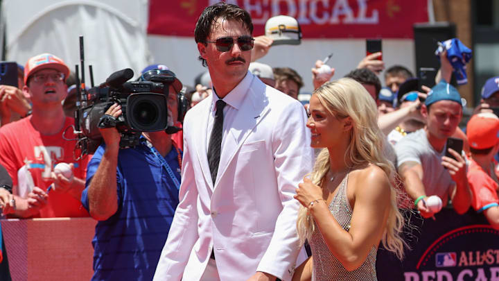 Pittsburgh Pirates pitcher Paul Skenes walks the red carpet with LSU gymnast and girlfriend Livvy Dunne before the 2024 MLB All-Star game. Pittsburgh Pirates pitcher Paul Skenes walks the red carpet with LSU gymnast and girlfriend Livvy Dunne before the 2024 MLB All-Star game.