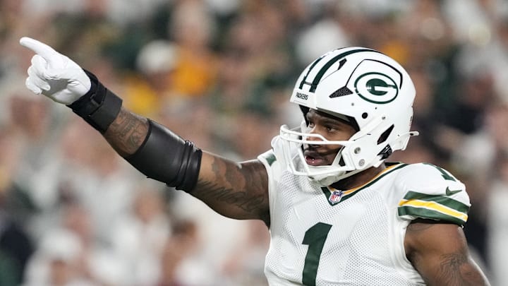 Green Bay Packers defensive end Micah Parsons (1) reacts after making a play against the Commander on Thursday.
