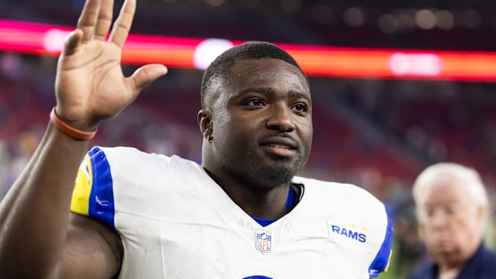 Dec 7, 2025; Glendale, Arizona, USA; Los Angeles Rams linebacker Byron Young (0) against the Arizona Cardinals at State Farm Stadium. Mandatory Credit: Mark J. Rebilas-Imagn Images