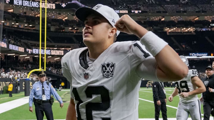 Dec 29, 2024; New Orleans, Louisiana, USA; Las Vegas Raiders quarterback Aidan O'Connell (12) pumps his fist after his team’s victory against the New Orleans Saints at Caesars Superdome. Mandatory Credit: Matthew Hinton-Imagn Images
