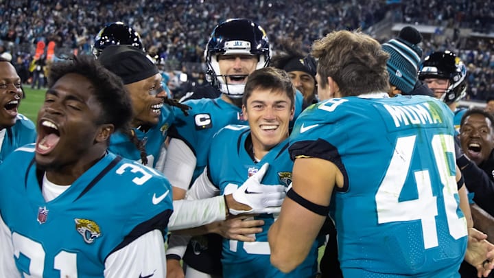 Jan 14, 2023; Jacksonville, Florida, USA; Jacksonville Jaguars kicker Riley Patterson (10) celebrates with teammates after hitting the winning field goal as time expired against the Los Angeles Chargers in the fourth quarter during a wild card game at TIAA Bank Field. Mandatory Credit: Mark J. Rebilas-Imagn Images Jan 14, 2023; Jacksonville, Florida, USA; Jacksonville Jaguars kicker Riley Patterson (10) celebrates with teammates after hitting the winning field goal as time expired against the Los Angeles Chargers in the fourth quarter during a wild card game at TIAA Bank Field. Mandatory Credit: Mark J. Rebilas-Imagn Images