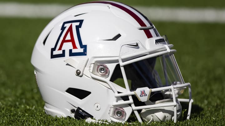 Nov 25, 2022; Tucson, Arizona, USA; Detailed view of an Arizona Wildcats helmet on the field during the Territorial Cup at Arizona Stadium. Mandatory Credit: Mark J. Rebilas-Imagn Images