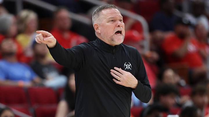 Mar 23, 2025; Houston, Texas, USA; Denver Nuggets head coach Michael Malone reacts during the third quarter against the Houston Rockets at Toyota Center. Mandatory Credit: Troy Taormina-Imagn Images