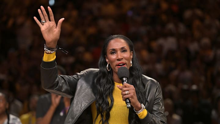 Jun 29, 2025; Los Angeles, California, USA; Former WNBA player Lisa Leslie introduces Candace Parker during her jersey retirement ceremony at halftime against the Chicago Sky at Crypto.com Arena. Mandatory Credit: Jayne Kamin-Oncea-Imagn Images Jun 29, 2025; Los Angeles, California, USA; Former WNBA player Lisa Leslie introduces Candace Parker during her jersey retirement ceremony at halftime against the Chicago Sky at Crypto.com Arena. Mandatory Credit: Jayne Kamin-Oncea-Imagn Images