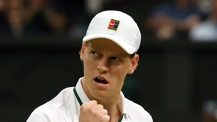 Jannik Sinner reacts after winning a point at Wimbledon