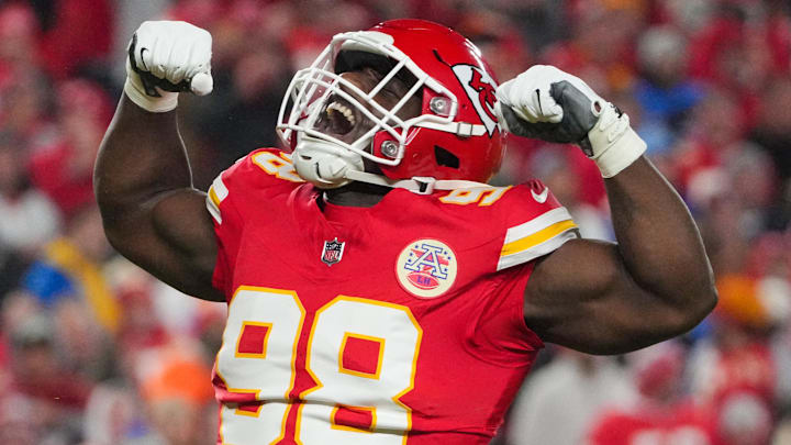 Dec 8, 2024; Kansas City, Missouri, USA; Kansas City Chiefs defensive tackle Tershawn Wharton (98) celebrates after a sack against the Los Angeles Chargers during the first half at GEHA Field at Arrowhead Stadium. Mandatory Credit: Denny Medley-Imagn Images