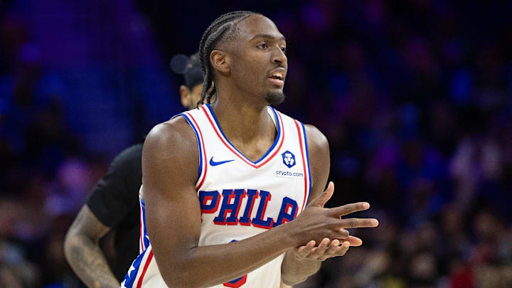 Feb 22, 2025; Philadelphia, Pennsylvania, USA; Philadelphia 76ers guard Tyrese Maxey (0) reacts to his three pointer against the Brooklyn Nets during the first quarter at Wells Fargo Center. Mandatory Credit: Bill Streicher-Imagn Images