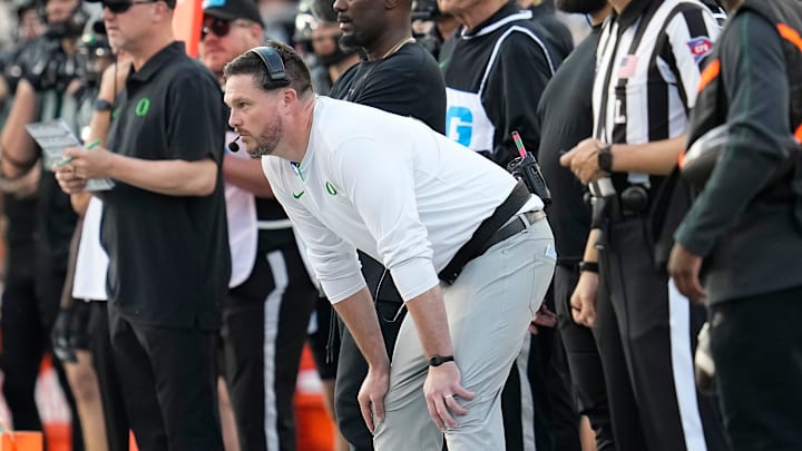 Oct 12, 2024; Eugene, Oregon, USA; Oregon Ducks head coach Dan Lanning watches during the first half of the NCAA football game against the Ohio State Buckeyes at Autzen Stadium