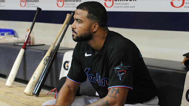 Sep 30, 2022; Milwaukee, Wisconsin, USA; Miami Marlins starting pitcher Sandy Alcantara (22) in the dugout during the seventh inning against the Milwaukee Brewers  at American Family Field. Mandatory Credit: Michael McLoone-Imagn Images