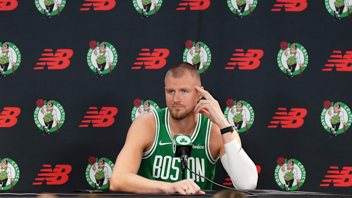 Sep 24, 2024; Boston, MA, USA; Boston Celtics center Kristaps Porzingis (8) talks to reporters during media day at Auerbach Center. Mandatory Credit: David Butler II-Imagn Images