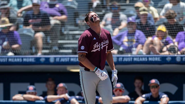 Texas A&M Aggies' Jace LaViolette (17) strains after getting hit in the hand by a pitch as Auburn Tigers take on Texas A&M Aggies during the SEC baseball tournament at Hoover Met in Birmingham, Ala., on Thursday, May 22, 2025. Texas A&M Aggies' Jace LaViolette (17) strains after getting hit in the hand by a pitch as Auburn Tigers take on Texas A&M Aggies during the SEC baseball tournament at Hoover Met in Birmingham, Ala., on Thursday, May 22, 2025.