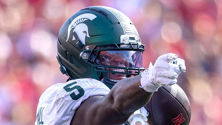 Oct 4, 2025; Lincoln, Nebraska, USA; Michigan State Spartans linebacker Jordan Hall (5) celebrates after an interception during the game against Nebraska at Memorial Stadium. Mandatory Credit: Kylie Graham-Imagn Images