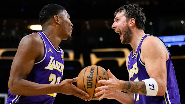 Los Angeles Lakers forward Rui Hachimura (28) and guard Luka Doncic (77) 