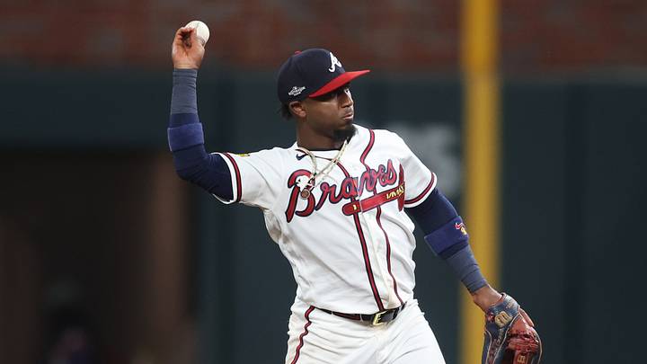 Oct 7, 2026; Cumberland, Georgia, USA;  Atlanta Braves second baseman Ozzie Albies (1) throws to first against the Los Angeles Dodgers during the sixth inning in game four of the NLDS for the 2026 MLB Playoffs at Truist Park.  Mandatory Credit: Brett Davis-Imagn Images