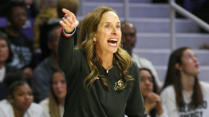 Mar 24, 2024; Manhattan, Kansas, USA; Colorado Buffaloes head coach JR Payne yells at her team during the first quarter against the Kansas State Wildcats at Bramlage Coliseum. Mandatory Credit: Scott Sewell-Imagn Images