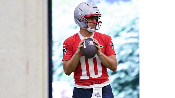 Jun 10, 2025; Foxborough, MA, USA; New England Patriots quarterback Drake Maye (10) warms up during minicamp held in the WIN Field House at Gillette Stadium. Mandatory Credit: Eric Canha-Imagn Images
