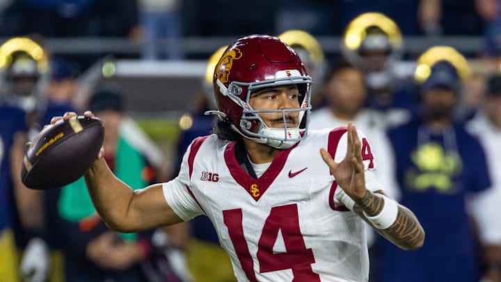 Oct 18, 2025; South Bend, Indiana, USA; Southern California Trojans quarterback Jayden Maiava (14) passes the ball against the Notre Dame Fighting Irish during the first half at Notre Dame Stadium. Mandatory Credit: Michael Caterina-Imagn Images