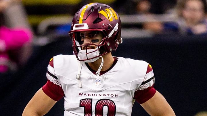 Dec 15, 2024; New Orleans, Louisiana, USA; Washington Commanders quarterback Marcus Mariota (18) looks on against the New Orleans Saints during the first half at Caesars Superdome. Mandatory Credit: Stephen Lew-Imagn Images Dec 15, 2024; New Orleans, Louisiana, USA; Washington Commanders quarterback Marcus Mariota (18) looks on against the New Orleans Saints during the first half at Caesars Superdome. Mandatory Credit: Stephen Lew-Imagn Images