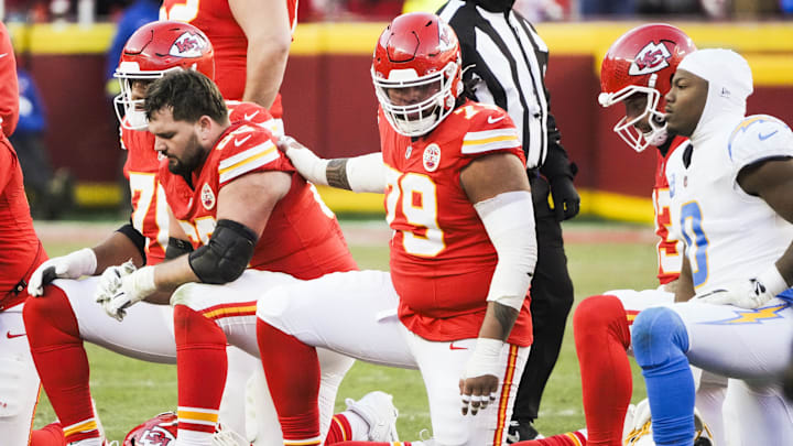 Dec 14, 2025; Kansas City, Missouri, USA; Kansas City Chiefs offensive lineman Esa Pole (79) takes a knee following an injury to quarterback Patrick Mahomes (not pictured) during the fourth quarter against the Los Angeles Chargers at GEHA Field at Arrowhead Stadium. Mandatory Credit: Denny Medley-Imagn Images Dec 14, 2025; Kansas City, Missouri, USA; Kansas City Chiefs offensive lineman Esa Pole (79) takes a knee following an injury to quarterback Patrick Mahomes (not pictured) during the fourth quarter against the Los Angeles Chargers at GEHA Field at Arrowhead Stadium. Mandatory Credit: Denny Medley-Imagn Images