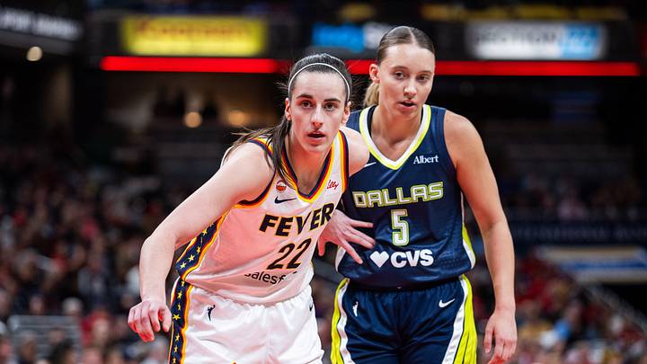 Indiana Fever guard Caitlin Clark (22) and Dallas Wings guard Paige Bueckers (5) Indiana Fever guard Caitlin Clark (22) and Dallas Wings guard Paige Bueckers (5)