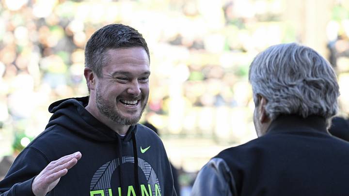 Nov 22, 2025; Eugene, Oregon, USA; Oregon Ducks head coach Dan Lanning smiles before the game against the Southern California Trojans at Autzen Stadium. Mandatory Credit: Troy Wayrynen-Imagn Images
