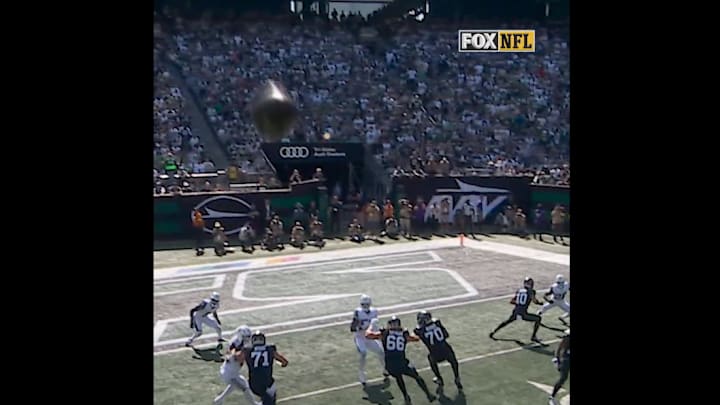 A deflected ball shoots towards the SkyCam.
