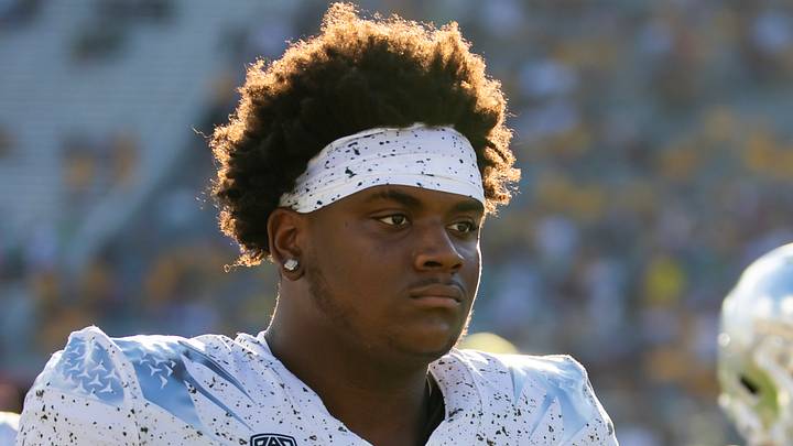 Nov 18, 2023; Tempe, Arizona, USA; Oregon Ducks defensive lineman A'Mauri Washington (58) against the Arizona State Sun Devils at Mountain America Stadium. Mandatory Credit: Mark J. Rebilas-USA TODAY Sports Nov 18, 2023; Tempe, Arizona, USA; Oregon Ducks defensive lineman A'Mauri Washington (58) against the Arizona State Sun Devils at Mountain America Stadium. Mandatory Credit: Mark J. Rebilas-USA TODAY Sports