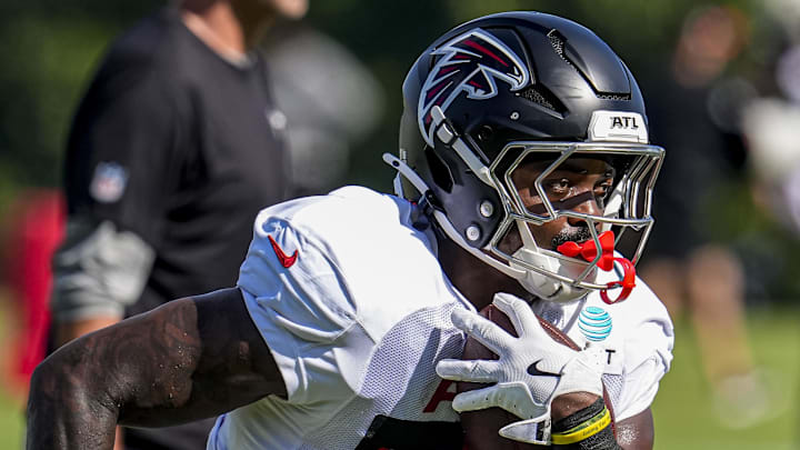 Jul 29, 2025; Atlanta, GA, USA; Atlanta Falcons running back Jashaun Corbin (30) runs after a catch during practice at training camp at IBM Performance Field. Mandatory Credit: Dale Zanine-Imagn Images