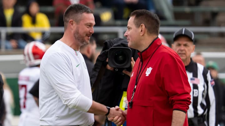 Oregon head coach Dan Lanning, left, shakes hands with Indiana head coach Curt Cignetti as the Oregon Ducks host the Indiana Hoosiers Oct. 11, 2025, at Autzen Stadium in Eugene, Oregon.