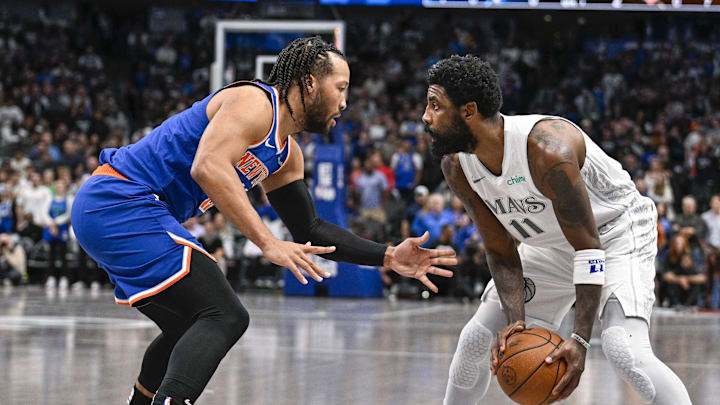 Nov 27, 2024; Dallas, Texas, USA; Dallas Mavericks guard Kyrie Irving (11) looks to move to the basket past New York Knicks guard Jalen Brunson (11) during the first quarter at the American Airlines Center. Mandatory Credit: Jerome Miron-Imagn Images