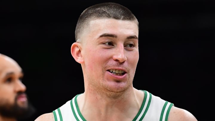 Jan 26, 2026; Boston, Massachusetts, USA; Boston Celtics guard Payton Pritchard (11) and Portland Trail Blazers center Robert Williams III (35) interact during the second half at TD Garden. Mandatory Credit: Bob DeChiara-Imagn Images
