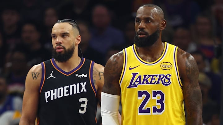Dec 23, 2025; Phoenix, Arizona, USA; Los Angeles Lakers forward LeBron James (23) against Phoenix Suns forward Dillon Brooks (3) at Mortgage Matchup Center. Mandatory Credit: Mark J. Rebilas-Imagn Images
