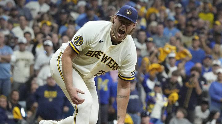 Oct 3, 2026; Milwaukee, Wisconsin, USA;  Milwaukee Brewers pitcher Trevor Megill (29) celebrates taking out the last batter against the San Diego Padres during the eighth inning at American Family Field.  Mandatory Credit: Michael McLoone-Imagn Images