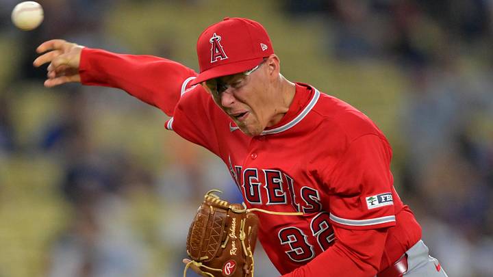 Mar 24, 2026; Los Angeles, California, USA;  Los Angeles Angels pitcher Ryan Johnson (32) delivers to the plate in the seventh inning against the Los Angeles Dodgers at Dodger Stadium. Mandatory Credit: Jayne Kamin-Oncea-Imagn Images