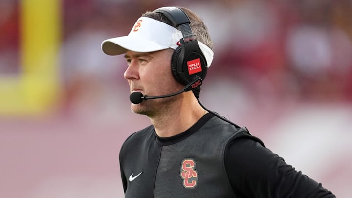 Aug 30, 2025; Los Angeles, California, USA; Southern California Trojans head coach Lincoln Riley watches from the sidelines against the Missouri State Bears in the first half at United Airlines Field at Los Angeles Memorial Coliseum. Mandatory Credit: Kirby Lee-Imagn Images