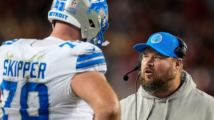 Detroit Lions offensive tackle Dan Skipper (70) talks to offensive line coach Hank Fraley during the second half against 49ers
