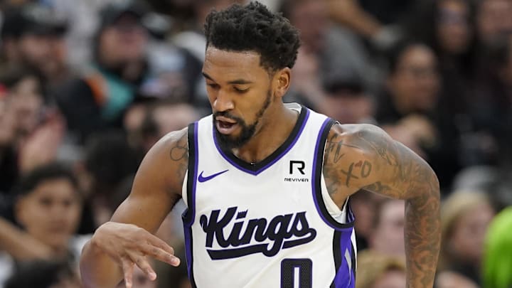 Dec 6, 2024; San Antonio, Texas, USA; Sacramento Kings guard Malik Monk (0) reacts after scoring a three pointer during the first half against the San Antonio Spurs at Frost Bank Center. Mandatory Credit: Scott Wachter-Imagn Images