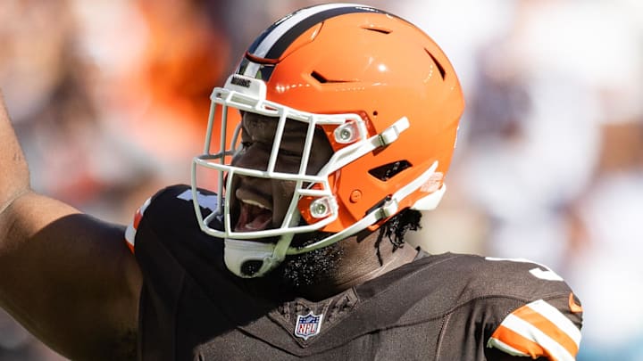 Sep 8, 2024; Cleveland, Ohio, USA; Cleveland Browns defensive tackle Dalvin Tomlinson (94) celebrates his sack against the Dallas Cowboys during the first quarter at Huntington Bank Field. Mandatory Credit: Scott Galvin-Imagn Images