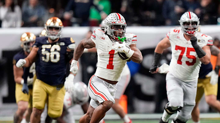 Ohio State Buckeyes running back Quinshon Judkins (1) gets away from the Notre Dame Fighting Irish defense for a long run in the third quarter during the College Football Playoff championship at Mercedes-Benz Stadium in Atlanta on January 20, 2025.