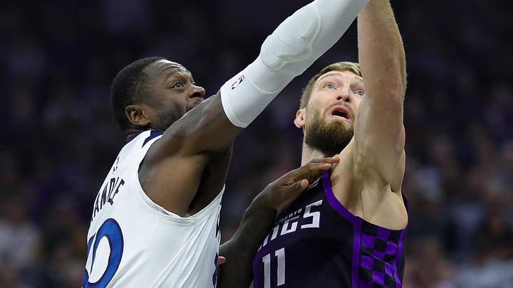 Nov 15, 2024; Sacramento, California, USA; Sacramento Kings forward Domantas Sabonis (11) and Minnesota Timberwolves forward Julius Randle (30) fight for a rebound during the first quarter at Golden 1 Center. Mandatory Credit: Sergio Estrada-Imagn Images