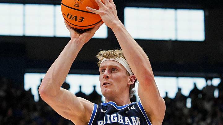 Jan 31, 2026; Lawrence, Kansas, USA; BYU Cougars guard Richie Saunders (15) shoots during the first half against the Kansas Jayhawks at Mizzou Arena. Mandatory Credit: Jay Biggerstaff-Imagn Images