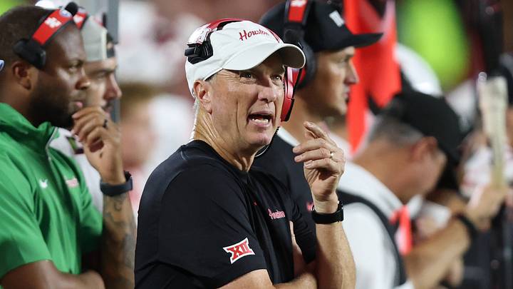 Sep 18, 2026; Lubbock, Texas, USA; Houston Cougars head coach Willie Fritz checks the score board in the second half of the game against the Texas Tech Red Raiders at Galaxy Stadium. Mandatory Credit: Michael C. Johnson-Imagn Images Sep 18, 2026; Lubbock, Texas, USA; Houston Cougars head coach Willie Fritz checks the score board in the second half of the game against the Texas Tech Red Raiders at Galaxy Stadium. Mandatory Credit: Michael C. Johnson-Imagn Images