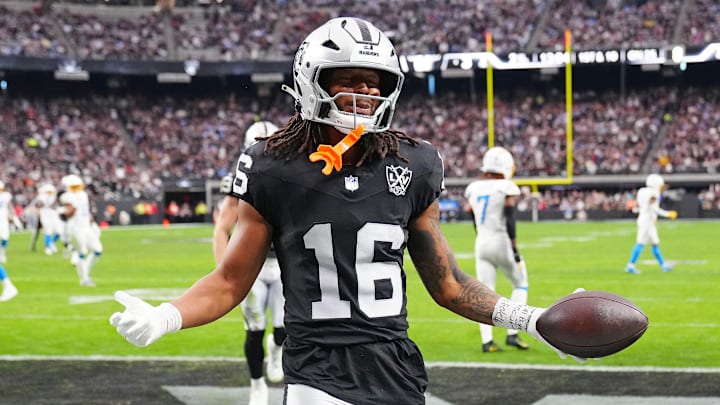 Jan 5, 2025; Paradise, Nevada, USA; Las Vegas Raiders wide receiver Jakobi Meyers (16) celebrates after scoring a touchdown against the Los Angeles Chargers during the second quarter at Allegiant Stadium. Mandatory Credit: Stephen R. Sylvanie-Imagn Images