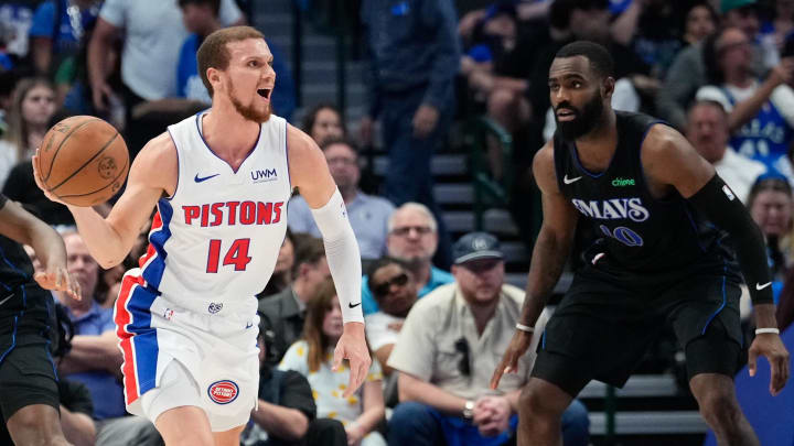 Apr 12, 2024; Dallas, Texas, USA; Detroit Pistons guard Malachi Flynn (14)  controls the ball as Dallas Mavericks forward Tim Hardaway Jr. (10) defends during the first half at American Airlines Center. Mandatory Credit: Chris Jones-USA TODAY Sports