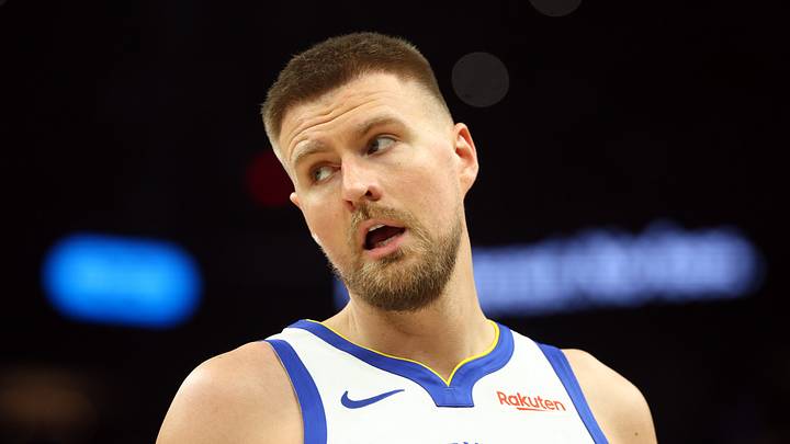 Apr 17, 2026; Phoenix, Arizona, USA; Golden State Warriors center Kristaps Porzingis (7) against the Phoenix Suns during the play-in rounds of the 2026 NBA Playoffs at Mortgage Matchup Center. Mandatory Credit: Mark J. Rebilas-Imagn Images